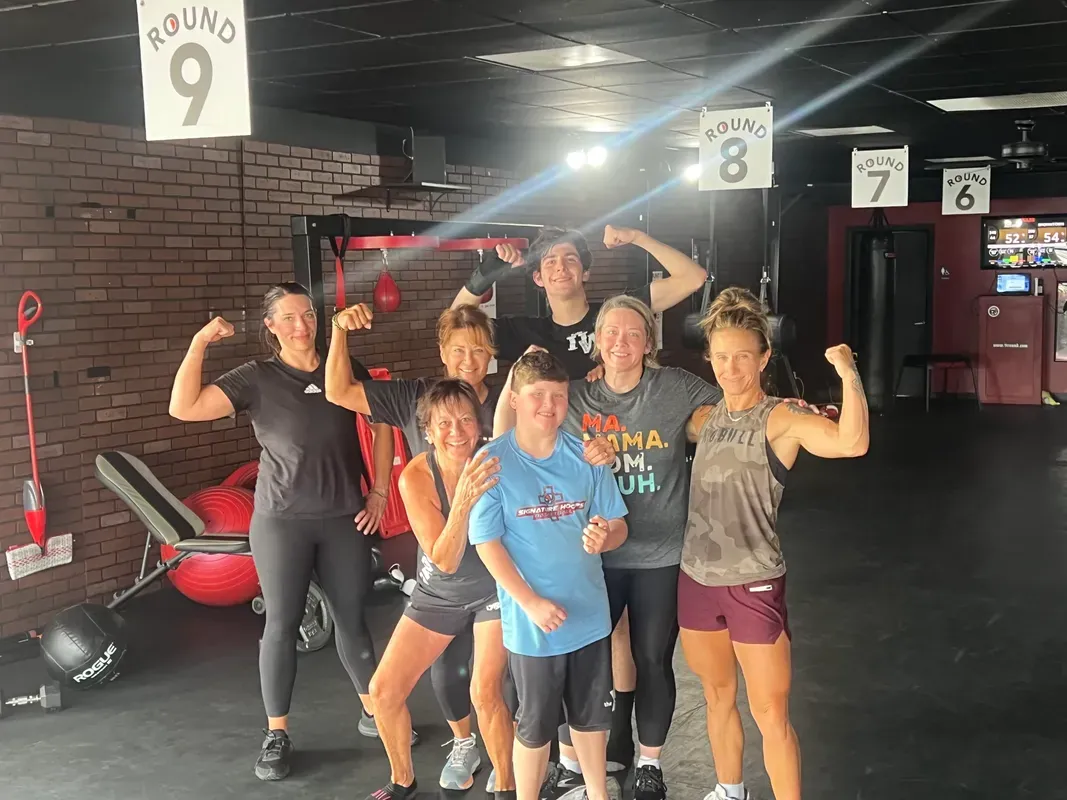 Members of every age flexing together after a class